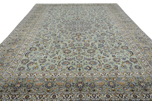 Surface texture of 2000s Kashan rug with natural Wool and intricate pattern