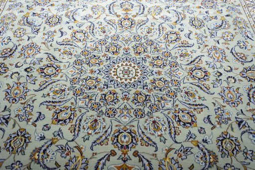 Central medallion detail of 2000s Kashan rug from Iran / Persia