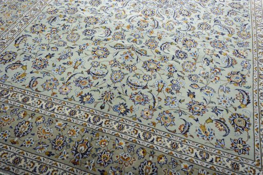 Close-up detail of 2000s Kashan rug from Iran / Persia showing Wool weave