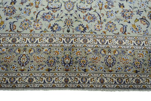 Full view of 2000s Kashan rug from Iran / Persia, 420 × 300 cm in Green tones