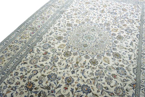 Backside of handmade 2000s Kashan rug showing knot structure and weave density