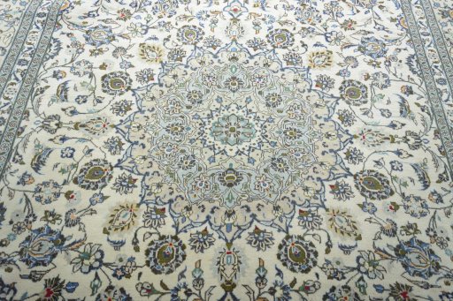 Central medallion detail of 2000s Kashan rug from Iran / Persia