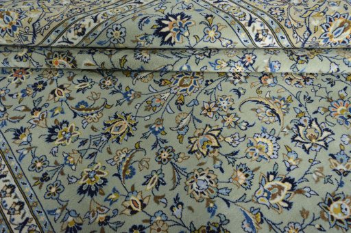 Close-up detail of 2000s Kashan rug from Iran / Persia showing Wool weave
