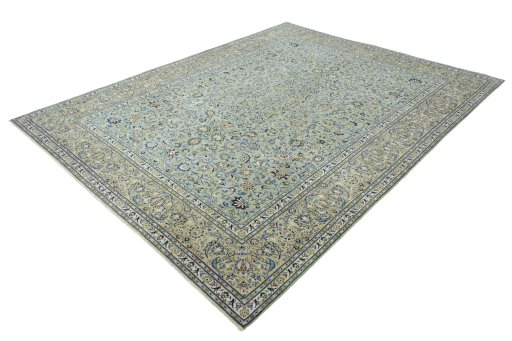 Corner detail of 2000s Kashan rug showing border pattern and Wool pile