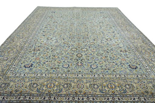 Surface texture of 2000s Kashan rug with natural Wool and intricate pattern