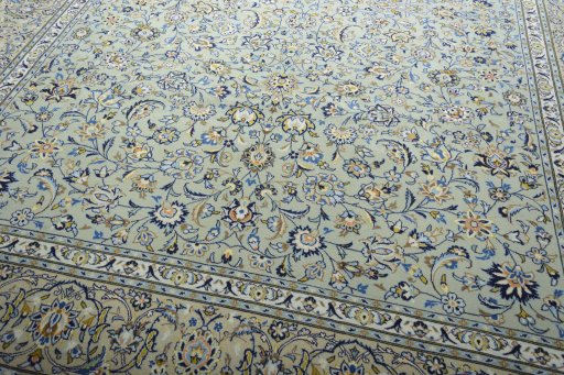 Close-up detail of 2000s Kashan rug from Iran / Persia showing Wool weave