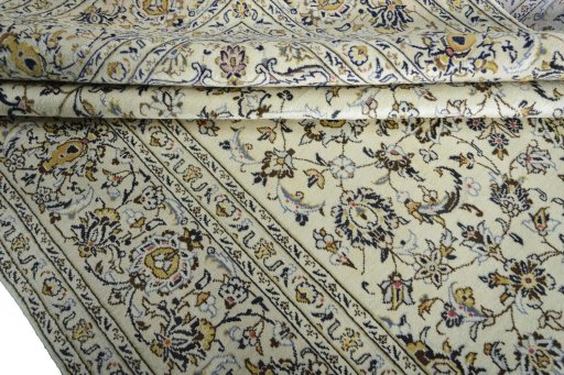 Close-up detail of 2000s Kashan rug from Iran / Persia showing Wool weave
