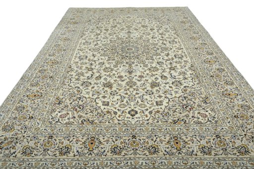 Surface texture of 2000s Kashan rug with natural Wool and intricate pattern