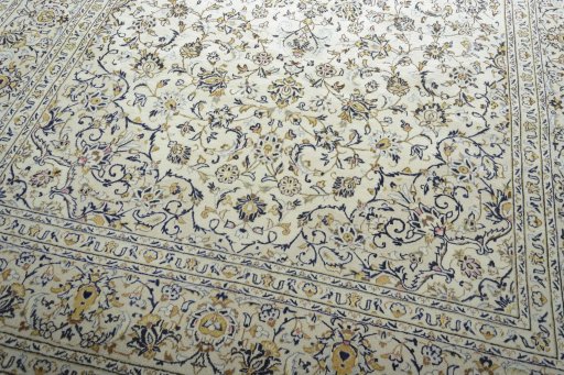 Close-up detail of 2000s Kashan rug from Iran / Persia showing Wool weave