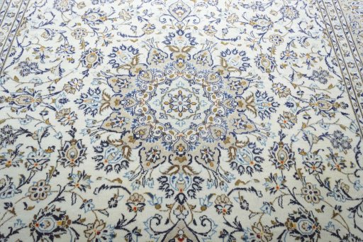Central medallion detail of 2000s Kashan rug from Iran / Persia