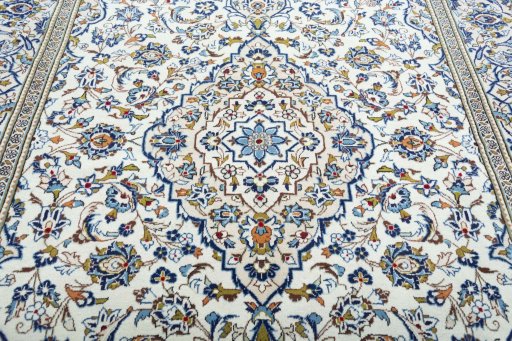 Central medallion detail of 2000s Kashan rug from Iran / Persia