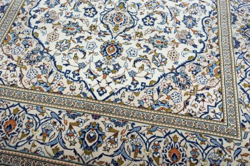 Close-up detail of 2000s Kashan rug from Iran / Persia showing Wool weave