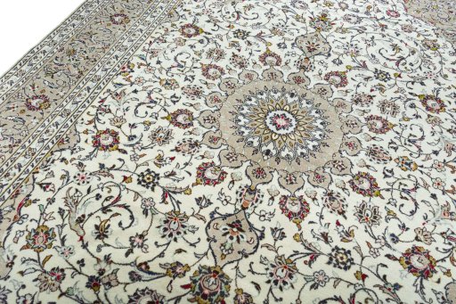 Backside of handmade New Kashan rug showing knot structure and weave density