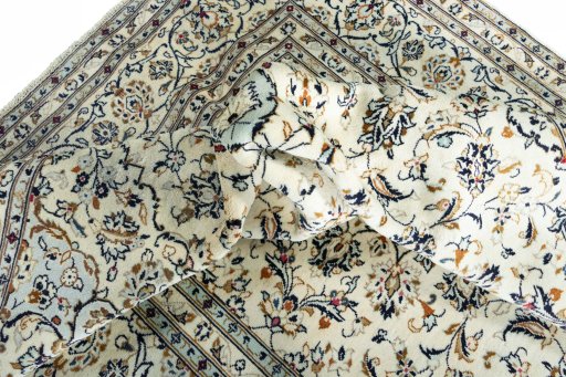 Surface texture of 2000s Kashan rug with natural Wool and intricate pattern