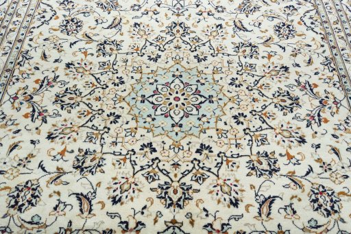 Central medallion detail of 2000s Kashan rug from Iran / Persia