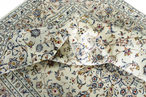 Surface texture of New Kashan rug with natural Wool and intricate pattern