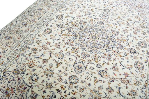 Backside of handmade New Kashan rug showing knot structure and weave density