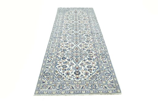 Surface texture of 2000s Kashan rug with natural Wool and intricate pattern