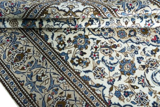 Close-up detail of 2000s Kashan rug from Iran / Persia showing Wool weave