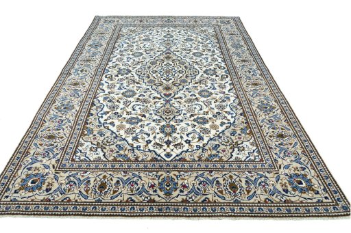 Surface texture of 2000s Kashan rug with natural Wool and intricate pattern
