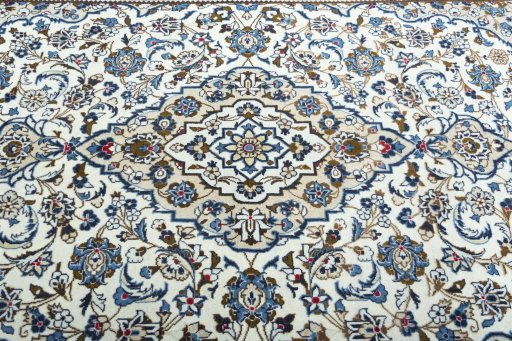 Central medallion detail of 2000s Kashan rug from Iran / Persia