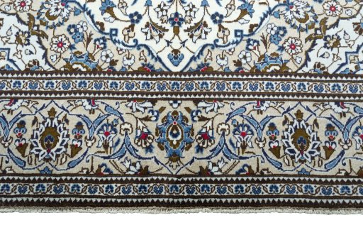 Full view of 2000s Kashan rug from Iran / Persia, 301 × 196 cm in Beige tones