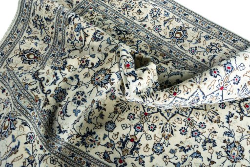Surface texture of New Kashan rug with natural Wool and intricate pattern