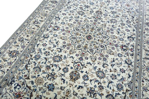 Backside of handmade New Kashan rug showing knot structure and weave density