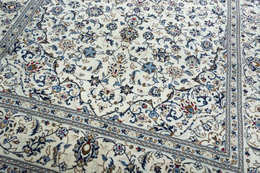 Close-up detail of New Kashan rug from Iran / Persia showing Wool weave