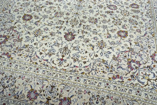 Close-up detail of 2000s Kashan rug from Iran / Persia showing Wool weave