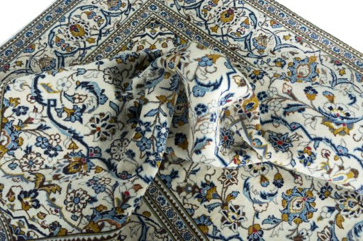 Surface texture of 2000s Kashan rug with natural Wool and intricate pattern