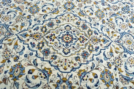 Central medallion detail of 2000s Kashan rug from Iran / Persia