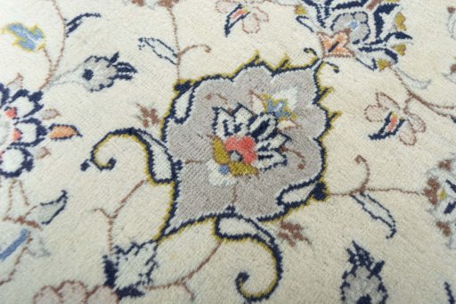 Close-up detail of 2000s Kashan rug from Iran / Persia showing Wool weave