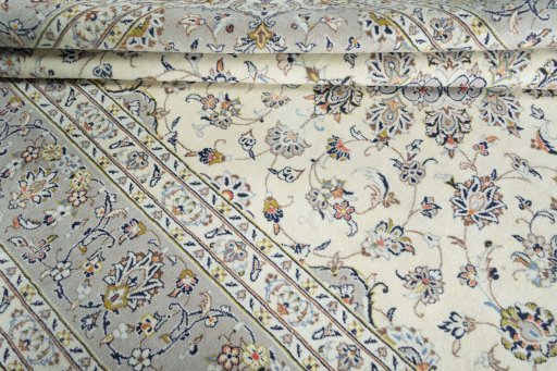 Surface texture of 2000s Kashan rug with natural Wool and intricate pattern