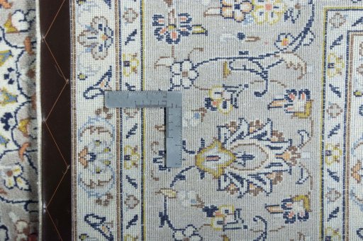 Central medallion detail of 2000s Kashan rug from Iran / Persia