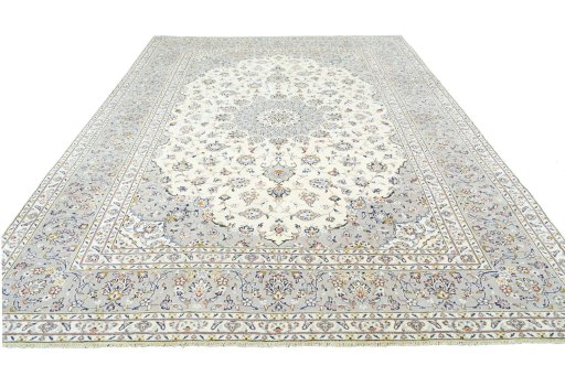 Surface texture of 2000s Kashan rug with natural Wool and intricate pattern