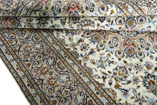 Close-up detail of 2000s Kashan rug from Iran / Persia showing Wool weave