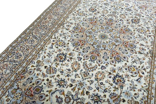 Backside of handmade 2000s Kashan rug showing knot structure and weave density