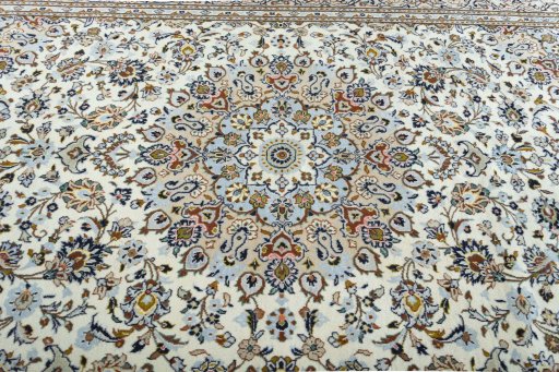 Central medallion detail of 2000s Kashan rug from Iran / Persia