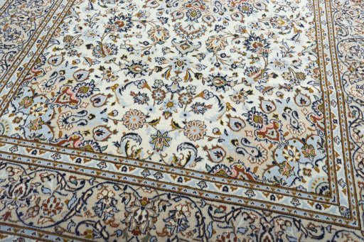 Close-up detail of 2000s Kashan rug from Iran / Persia showing Wool weave