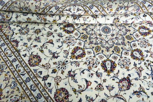 Close-up detail of 2000s Kashan rug from Iran / Persia showing Wool weave