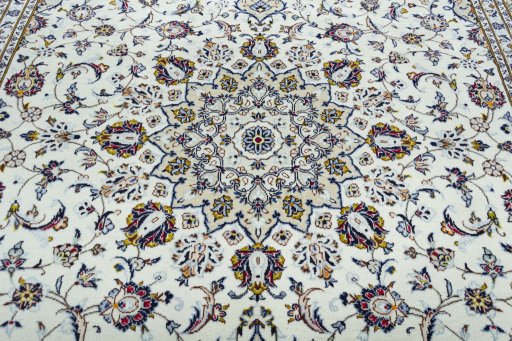 Central medallion detail of 2000s Kashan rug from Iran / Persia