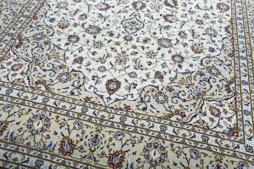 Close-up detail of 2000s Kashan rug from Iran / Persia showing Wool weave