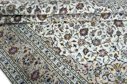 Close-up detail of 2000s Kashan rug from Iran / Persia showing Wool weave