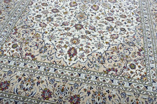Close-up detail of 2000s Kashan rug from Iran / Persia showing Wool weave