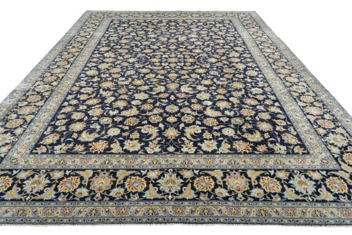 Surface texture of 2000s Kashan rug with natural Wool and intricate pattern