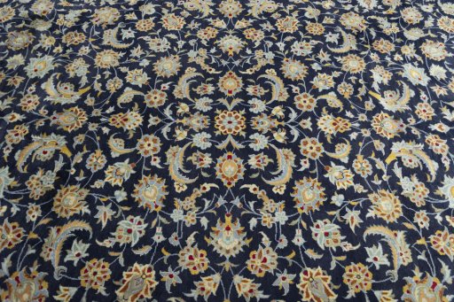 Central medallion detail of 2000s Kashan rug from Iran / Persia