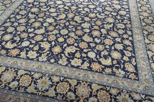 Close-up detail of 2000s Kashan rug from Iran / Persia showing Wool weave