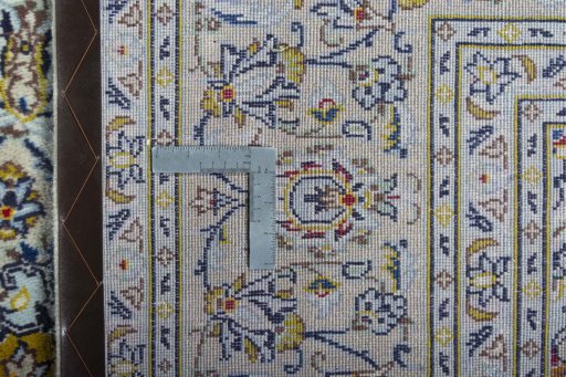 Central medallion detail of 2000s Kashan rug from Iran / Persia