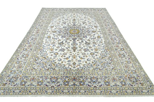 Surface texture of 2000s Kashan rug with natural Wool and intricate pattern
